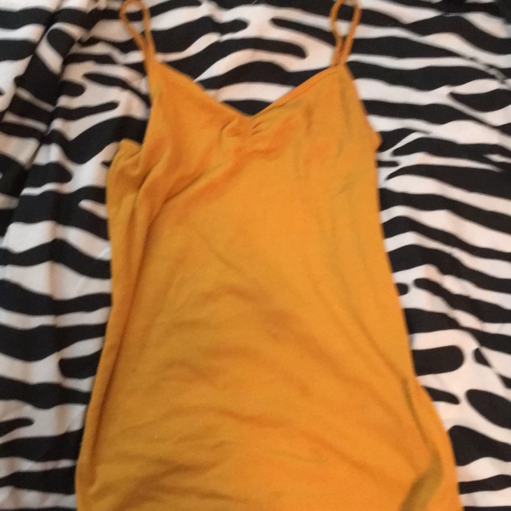 A nice tank top that mustard yellow